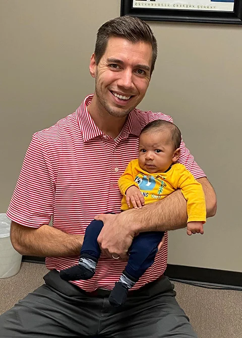 Chiropractor Cordova TN Jared Wootton With Infant